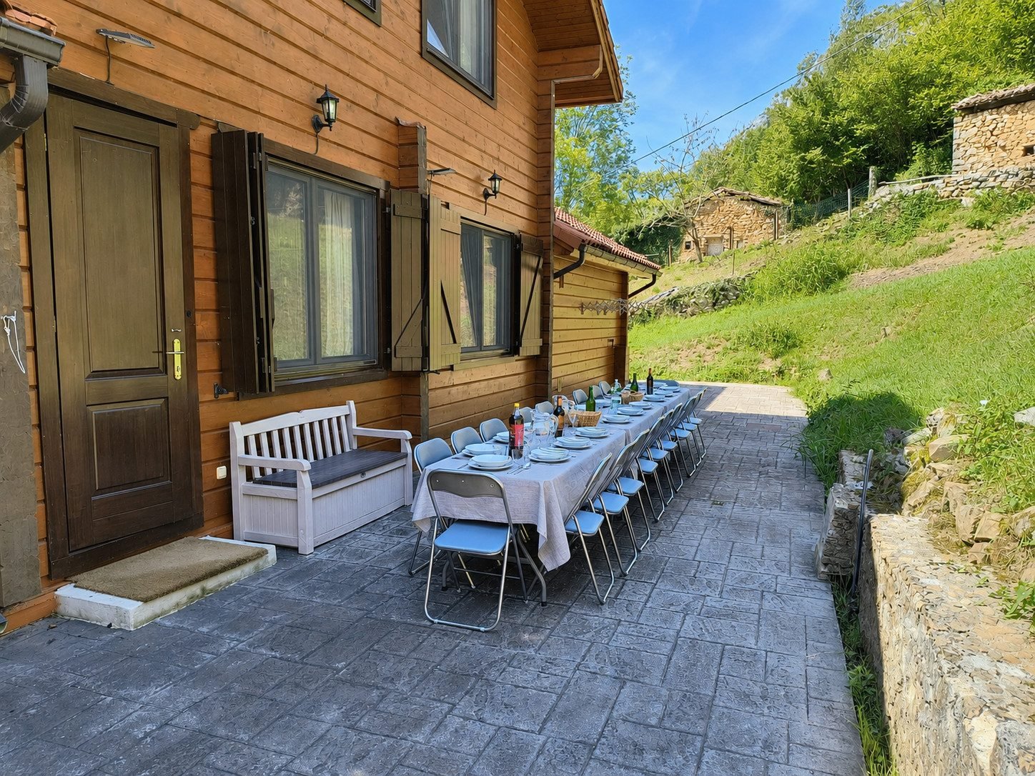 Long table beside the house entrance