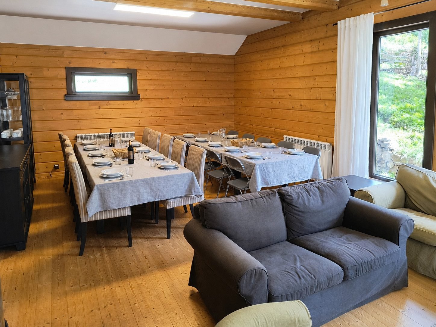 Dining room with two large tables laid